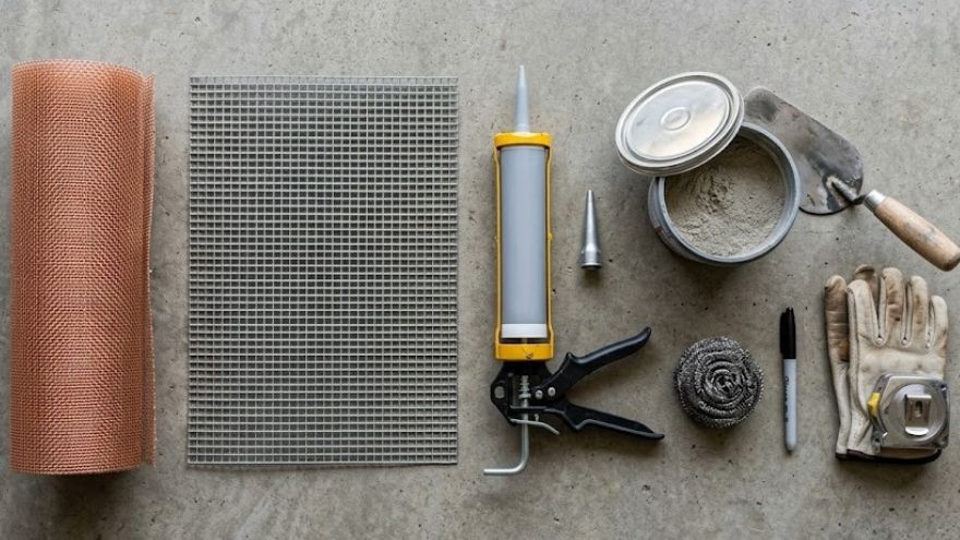 Rodent-proofing materials — copper mesh, hardware cloth, caulk gun, and hydraulic cement for Texas home exclusion